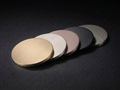 Cast London finish sample discs in all five finishes: Cast Brass, Cast Nickel, Cast Bronze, Cast Black and Cast Gunmetal