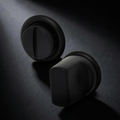 Velo Turn set in Cast Black — thumb turn and coin release on honed charcoal