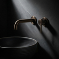 Fonte Wall-Mounted Basin Mixer 140mm in Cast Bronze in a cloakroom